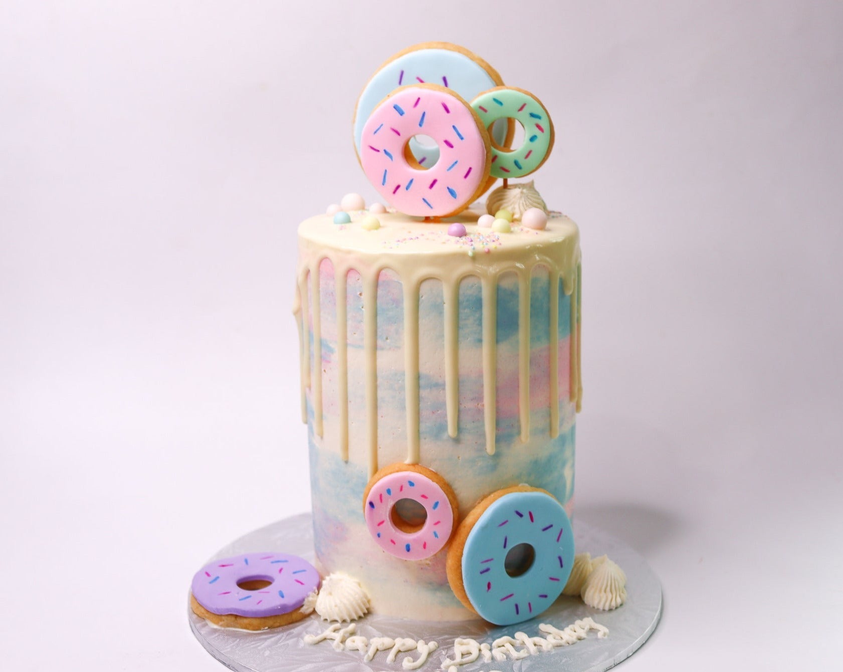 Loaded Donut Drip Cake - CakeCentral.com