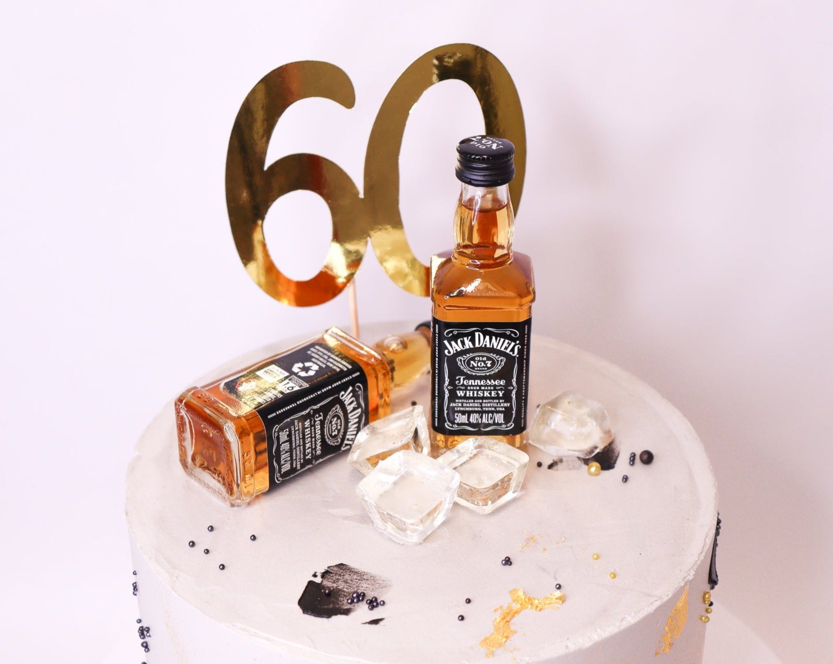 Jack Daniels whiskey bottle cake - Decorated Cake by - CakesDecor